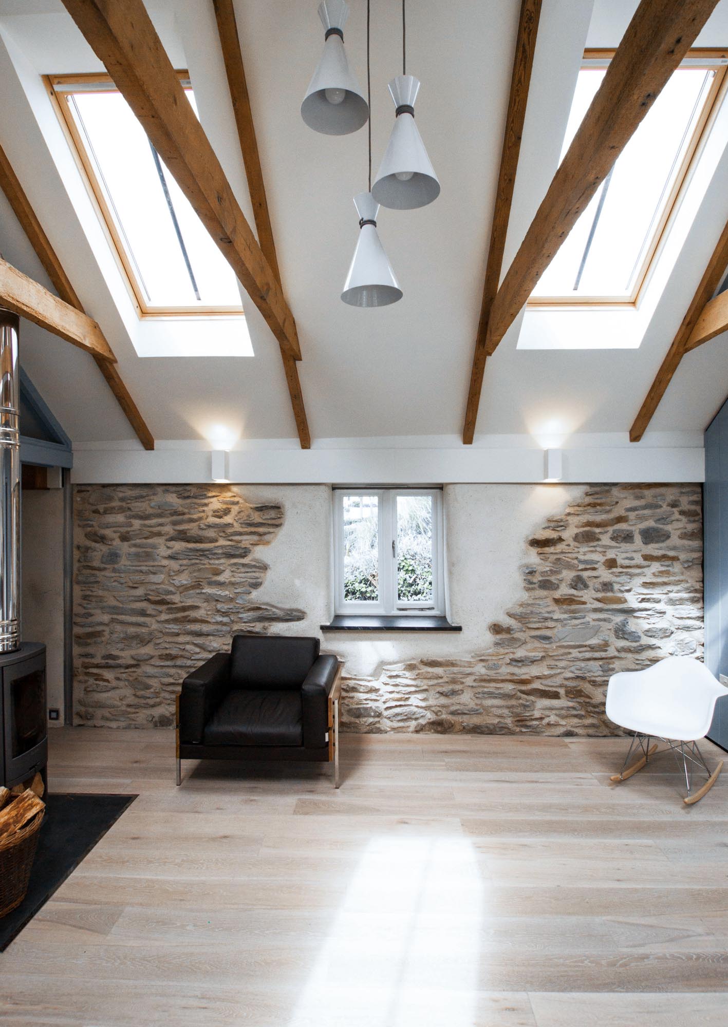 Exposed stone and original timber beams in the beautiful cottage.