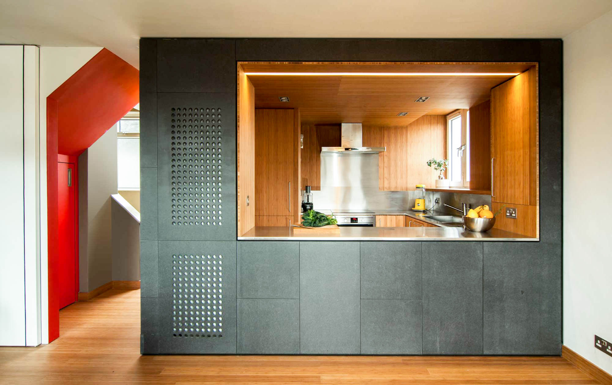 Kitchen pod lined with plyboo on interior and steel worktop