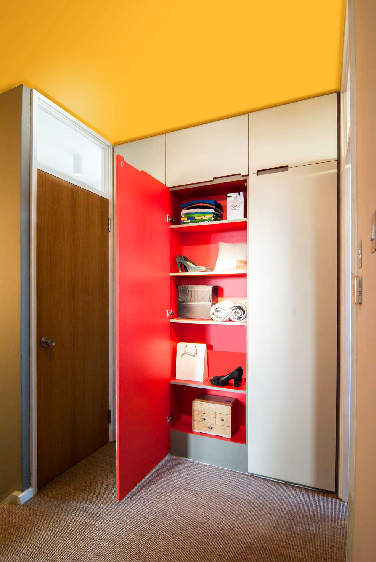 Bespoke joinery with red painted interior