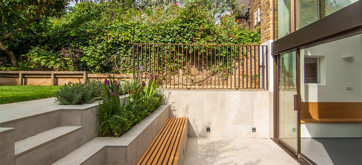 Levels and steps in the sunken courtyard of the spacious rear extension.