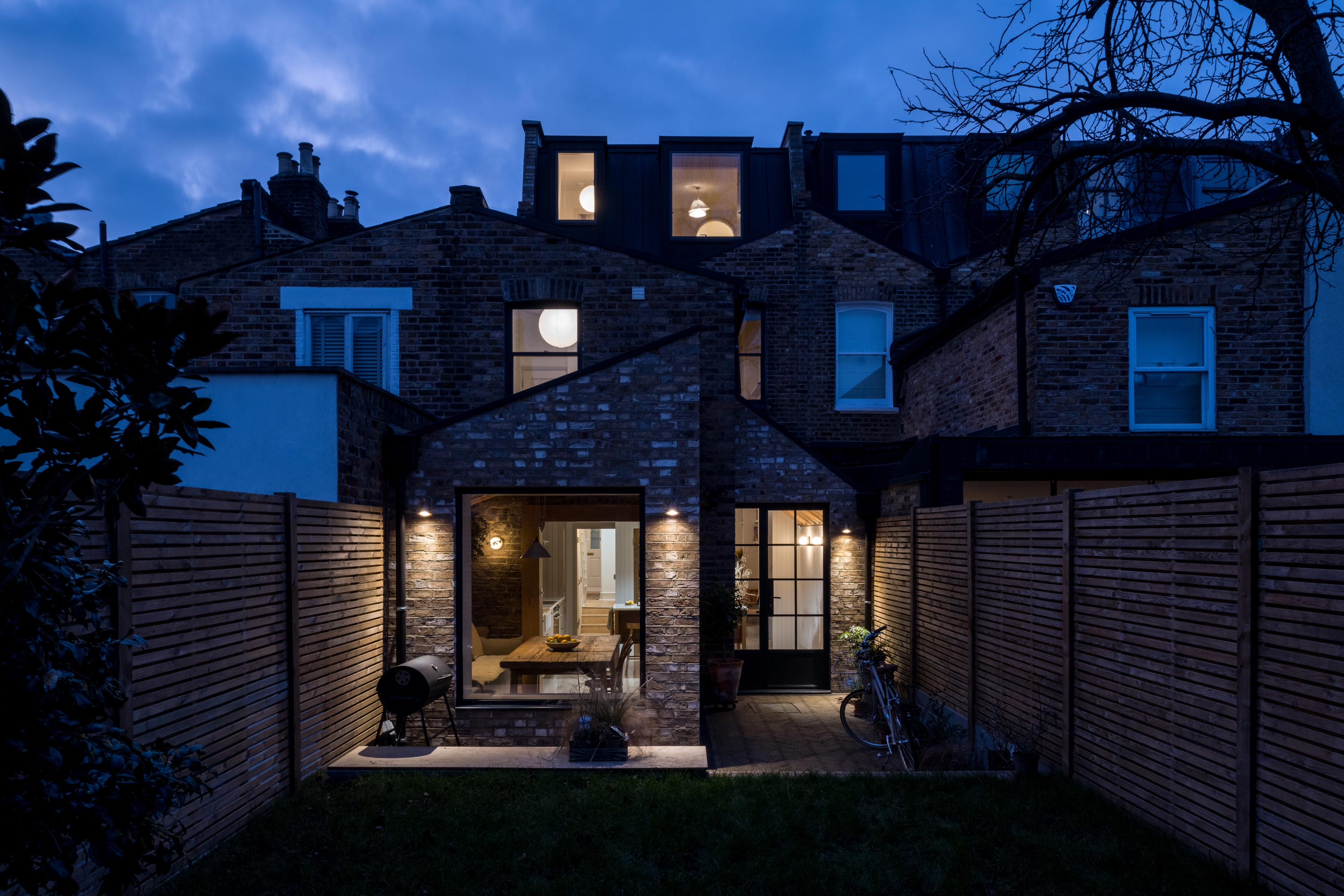 REAR VIEW NIGHT SHOT DARK EVENING GARDEN PATIO