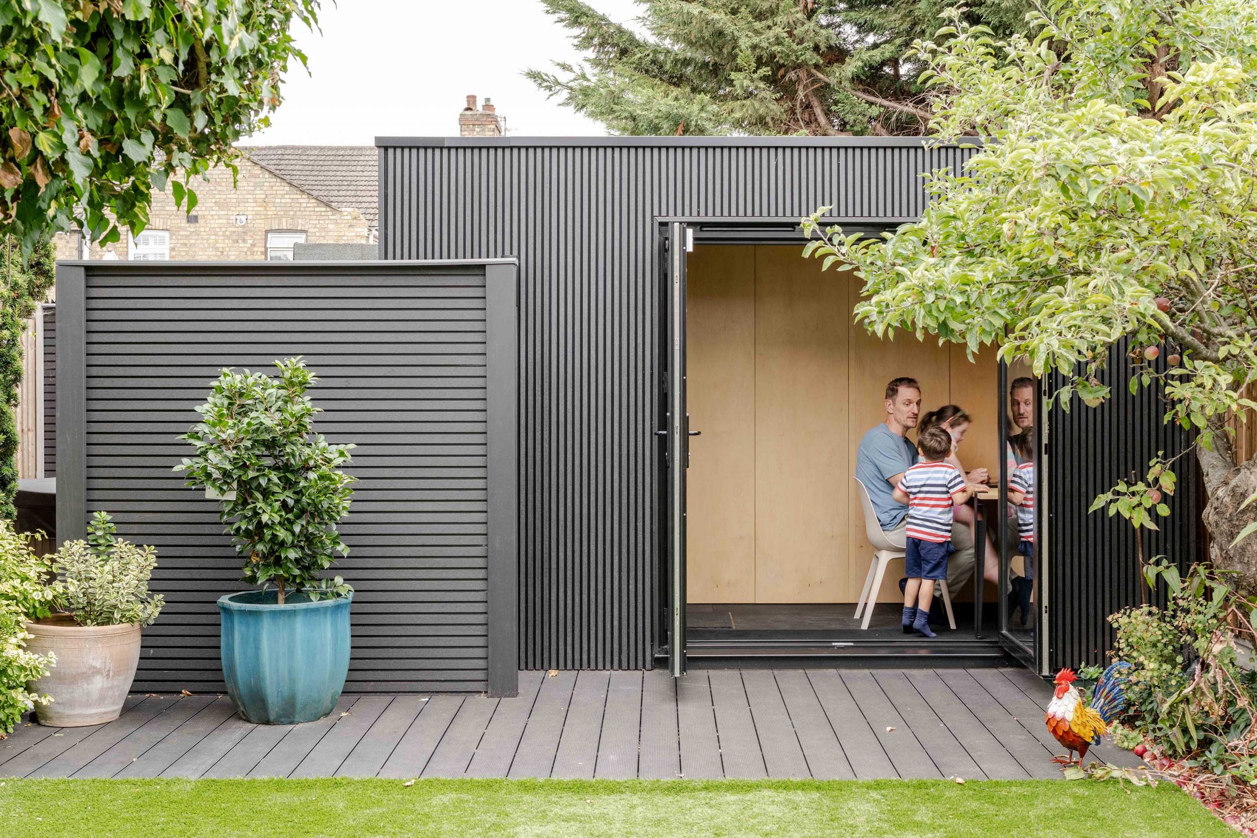 Rear garden with studio building and clearly defined zones.