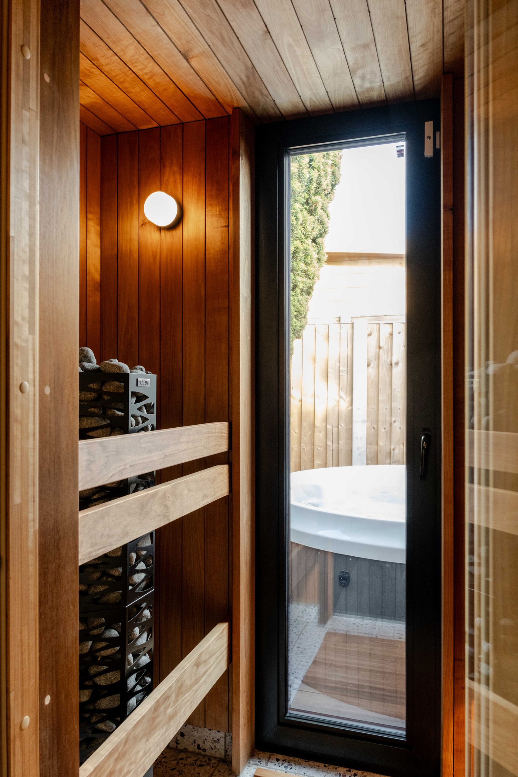 View from sauna looking out to hot tub