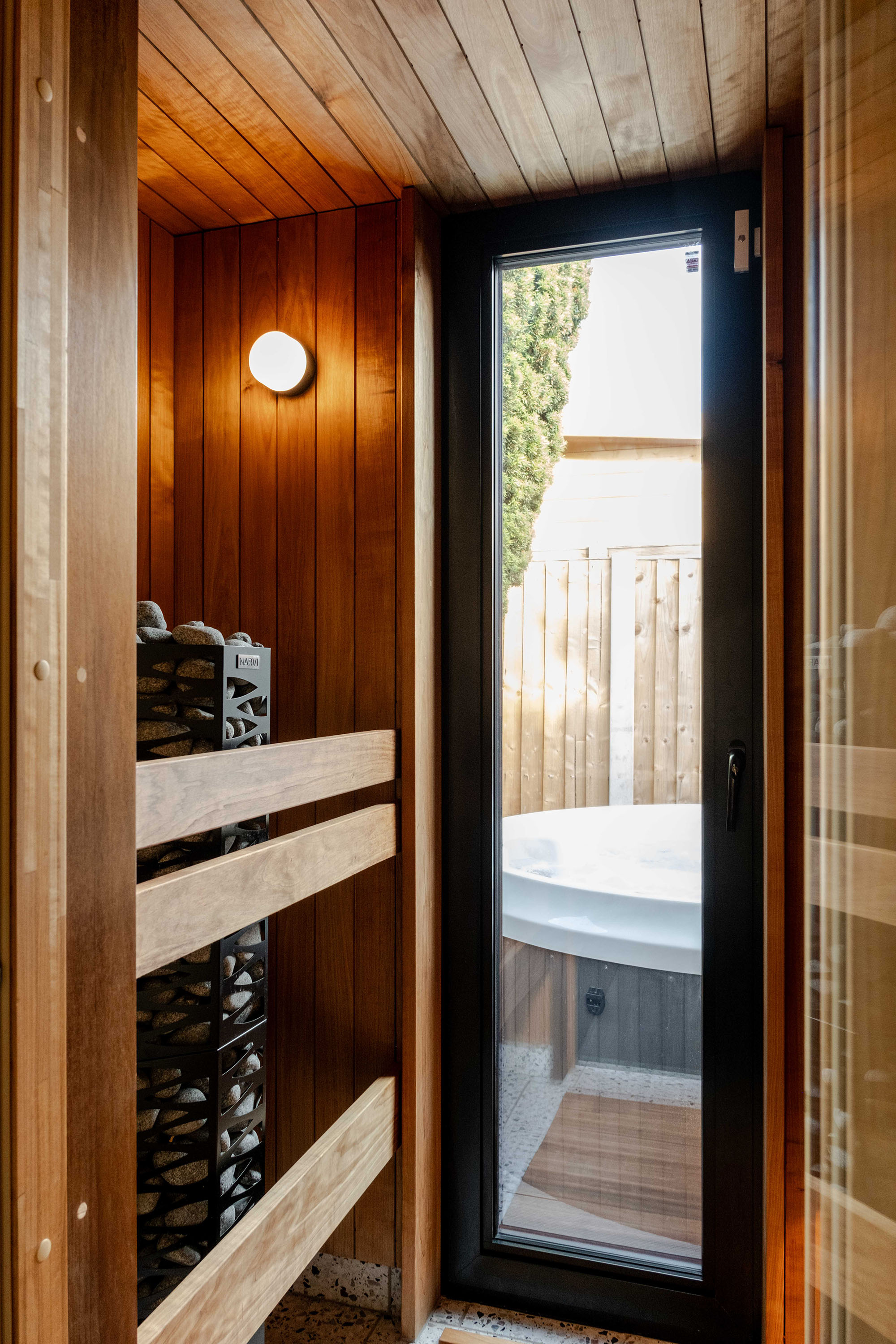 View from sauna looking out to hot tub