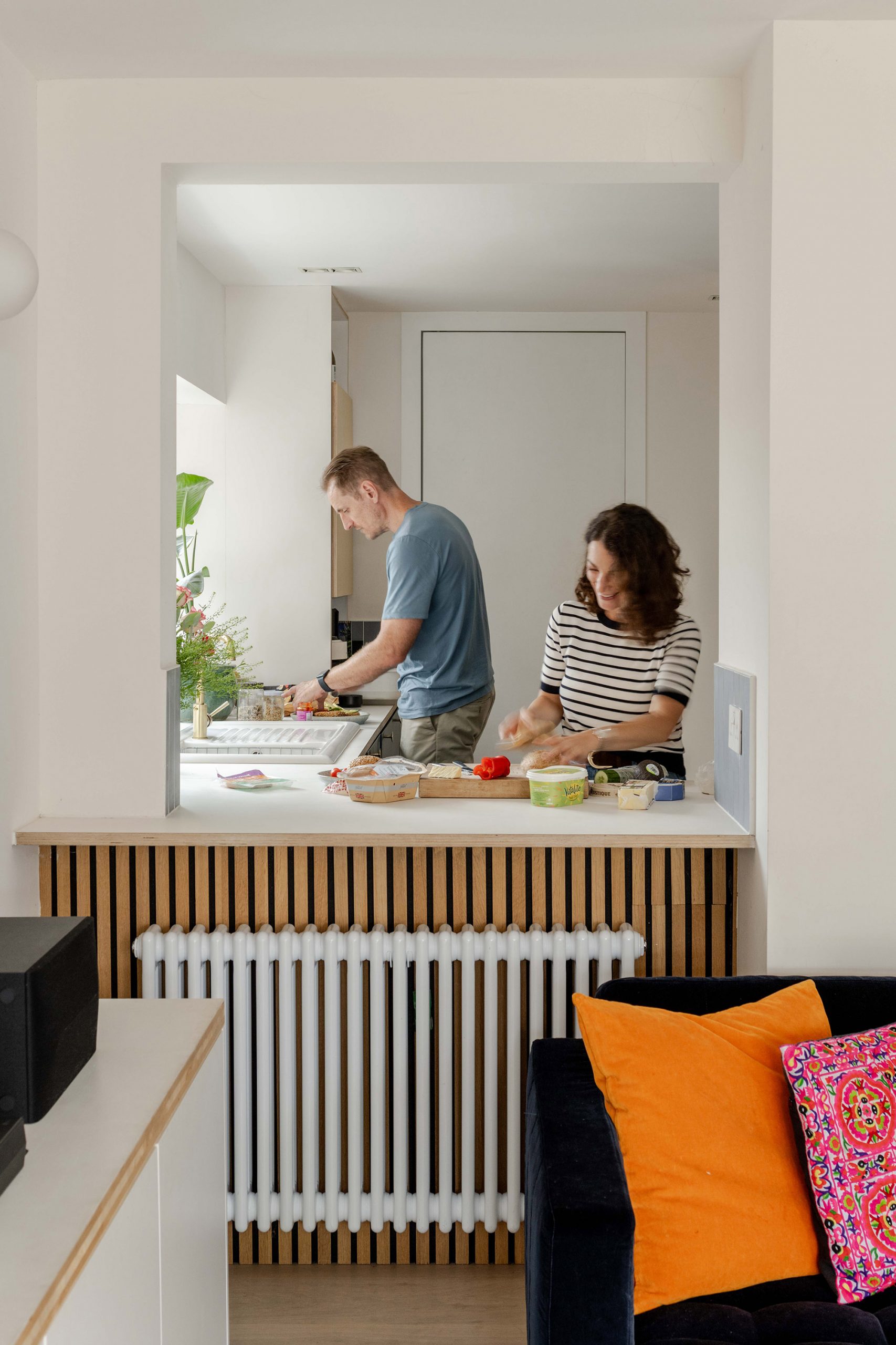 Kitchen interior with neutral finishes and restrained colour palette.