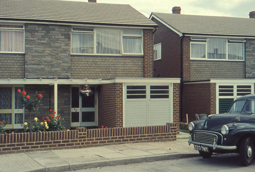 Original photos of the property from the 1960's when it was first built, with vintage car in the foreground