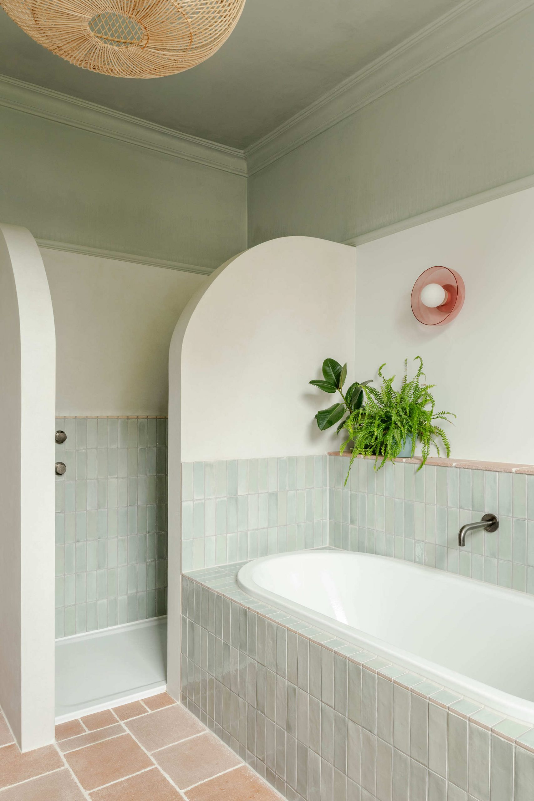 Modern bathroom with warm material palette in a London residential renovation designed by Bradley Van Der Straeten Architects.