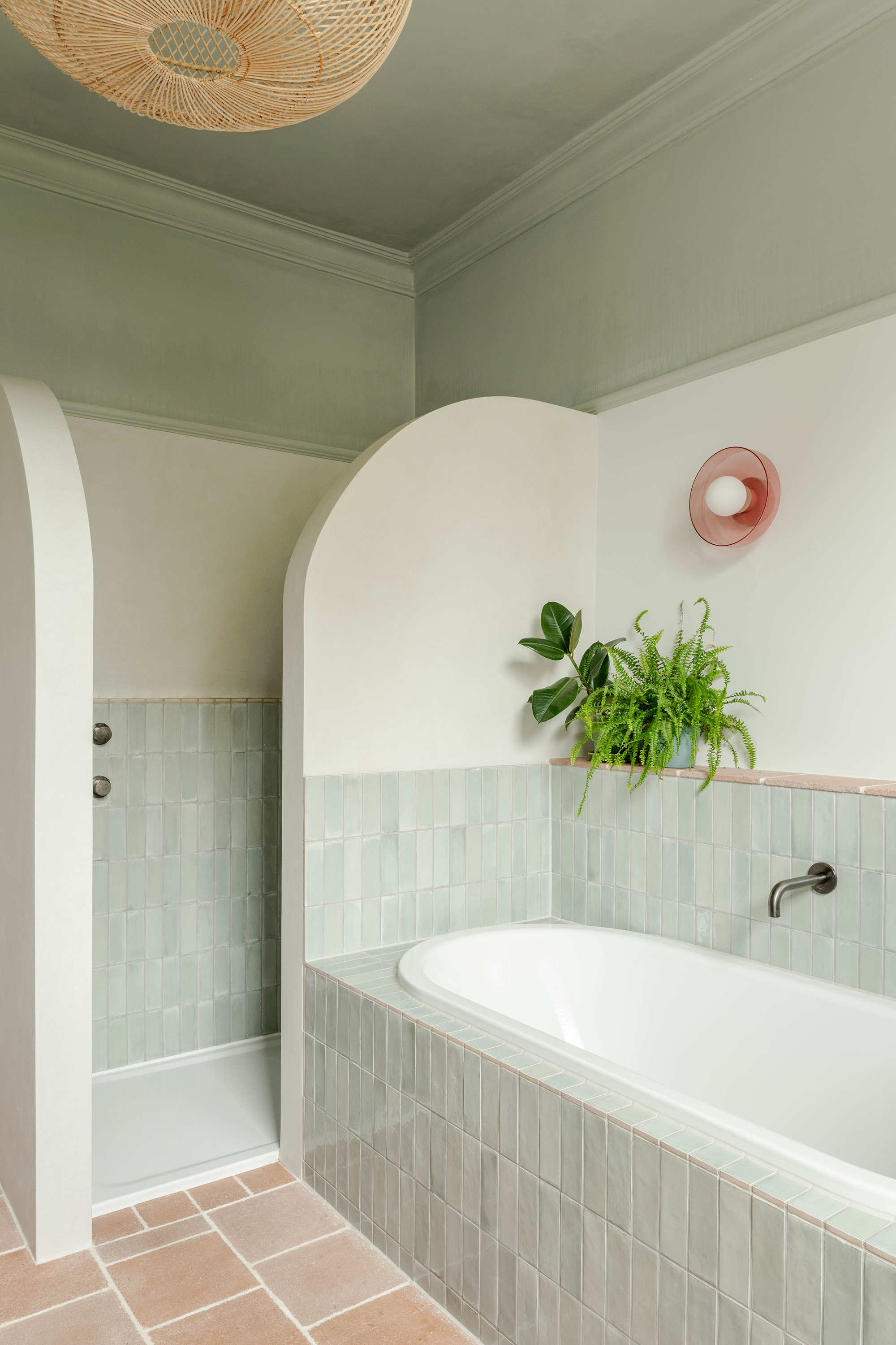 Modern bathroom with warm material palette in a London residential renovation designed by Bradley Van Der Straeten Architects.