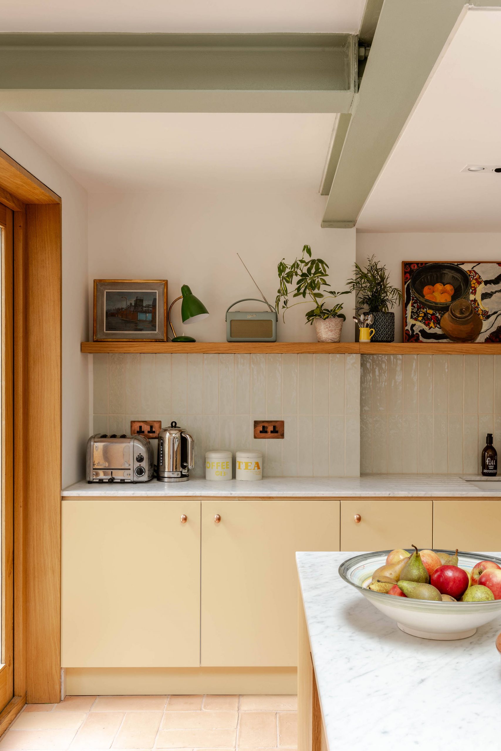 Garden-facing kitchen and dining room in a Stoke Newington home extension designed by Bradley Van Der Straeten Architects.